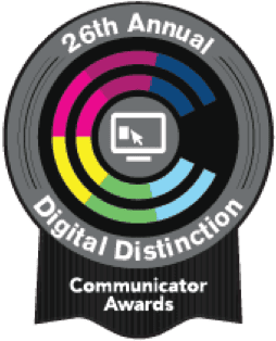Circular badge for the 26th Annual Digital Distinction Communicator Awards, featuring a central icon of a computer screen with cursor, surrounded by colored segments. Perfect for showcasing excellence in web design and digital marketing services.