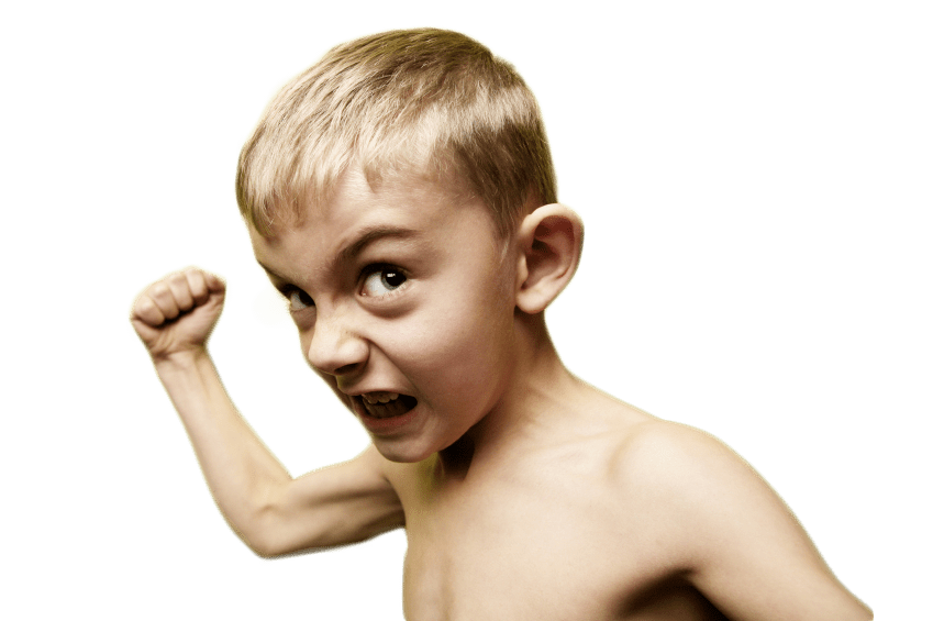 A young boy with short blond hair displays an intense expression, flexing his right arm at the camera with a determined look, like the face of success in a digital marketing agency. He is shirtless and stands against a plain background.