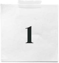 A white paper note with a single piece of tape at the top. The number 1 is printed in large black font in the center, reminiscent of how a leading digital marketing agency might prioritize its strategies for success.