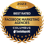 A gold and dark blue award badge reads 2023 Winner Best Rated Facebook Marketing Agencies Columbus, adorned with a laurel wreath design, highlighting top digital marketing services, issued by SocialAppsHQ.